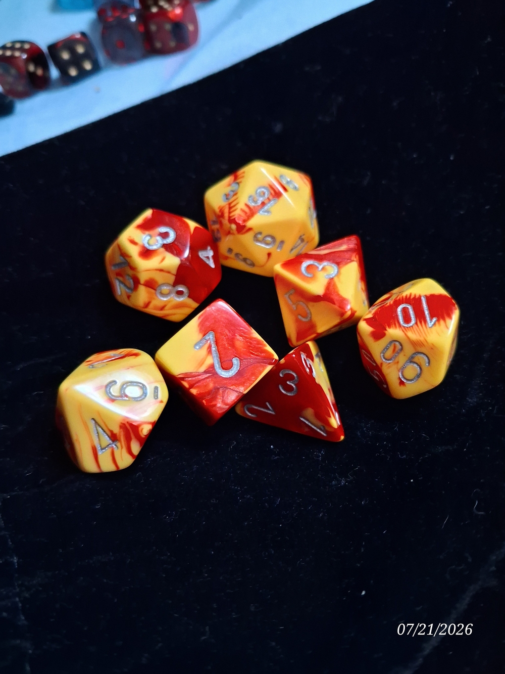 Source Unknown Red and Yellow Swirl RPG Dice Set - 7pc